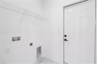 2716 25th St SW, Lehigh Acres, FL 33976 - Photo 35