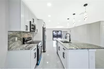 3411 27th St SW, Lehigh Acres, FL 33976 - Photo 9