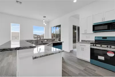 3003 27th St SW, Lehigh Acres, FL 33976 - Photo 5