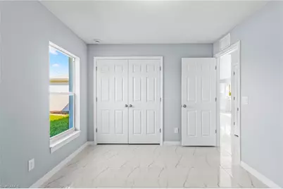 1246 Ecclesia St E, Lehigh Acres, FL 33974 - Photo 23