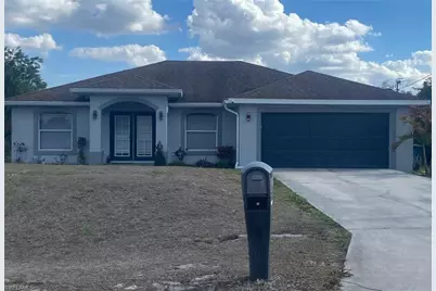 242 Pullman St, Lehigh Acres, FL 33974 - Photo 1