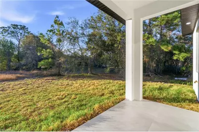 566 Eisenhower Blvd, Lehigh Acres, FL 33974 - Photo 29