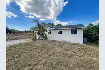 849 Theodore Vail St E, Lehigh Acres, FL 33974 - Photo 3