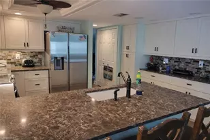 11660 Spinnaker Way, Fort Myers, FL 33908 - Photo 7