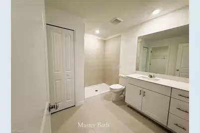 335 Parish Dr, Lehigh Acres, FL 33974 - Photo 9