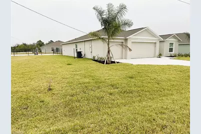 335 Parish Dr, Lehigh Acres, FL 33974 - Photo 1