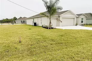 335 Parish Dr, Lehigh Acres, FL 33974 - Photo 1