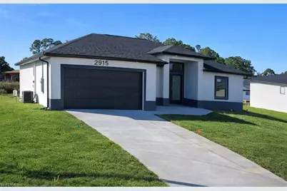 2915 24th St W, Lehigh Acres, FL 33976 - Photo 1