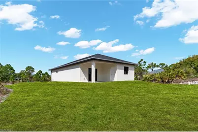 1037 Citrus Ave S, Lehigh Acres, FL 33974 - Photo 17