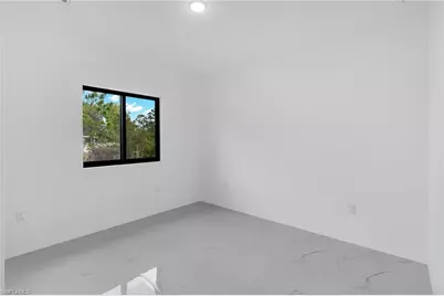 1037 Citrus Ave S, Lehigh Acres, FL 33974 - Photo 13