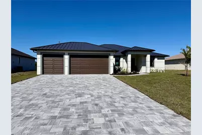 106 NE 8th Pl, Cape Coral, FL 33993 - Photo 1
