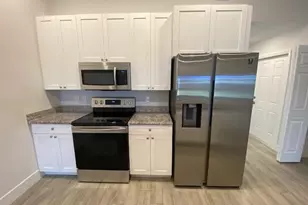 117/121 SE 13th St, Cape Coral, FL 33990 - Photo 5