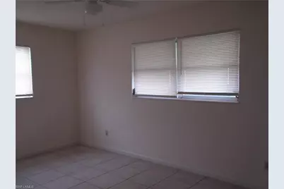 242 S Lake Dr, Lehigh Acres, FL 33936 - Photo 13