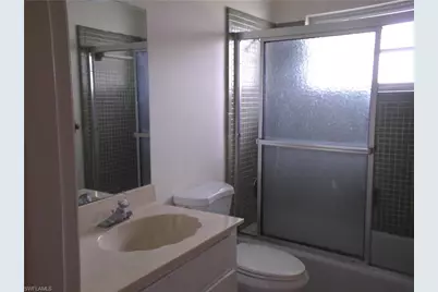 242 S Lake Dr, Lehigh Acres, FL 33936 - Photo 11