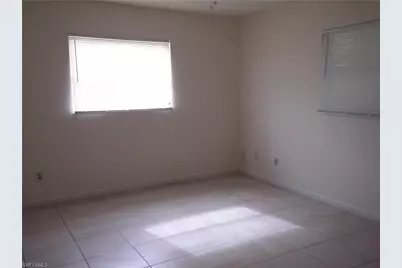 242 S Lake Dr, Lehigh Acres, FL 33936 - Photo 9