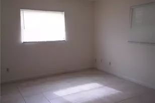 242 S Lake Dr, Lehigh Acres, FL 33936 - Photo 9