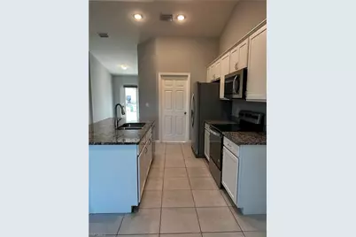 1011 NW 22nd Ter, Cape Coral, FL 33993 - Photo 9