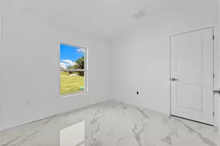 814 Milano Ave S, Lehigh Acres, FL 33974 - Photo 13