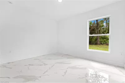 814 Milano Ave S, Lehigh Acres, FL 33974 - Photo 23