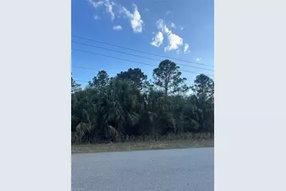 665 Woodcrest Dr, Lehigh Acres, FL 33972 - Photo 1
