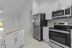 710 NW 2nd Ln, Cape Coral, FL 33993 - Photo 7