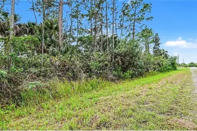 515 Woodman Dr, Lehigh Acres, FL 33972 - Photo 1