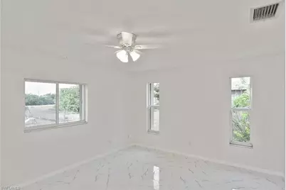 530 Peerless Cir, Lehigh Acres, FL 33974 - Photo 29