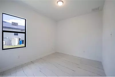 2604 73rd St W, Lehigh Acres, FL 33971 - Photo 17