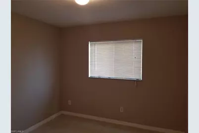 907 Chenault St, Lehigh Acres, FL 33974 - Photo 7