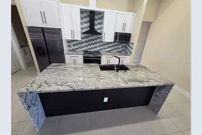 1140 NW 19th Ave, Cape Coral, FL 33993 - Photo 7