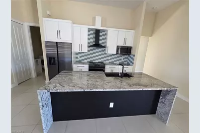 1140 NW 19th Ave, Cape Coral, FL 33993 - Photo 5