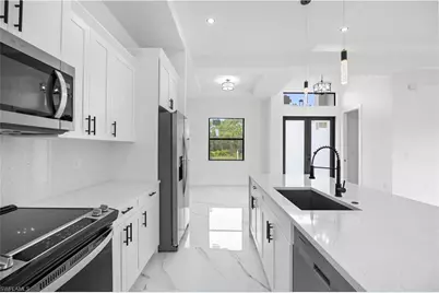 719 Fullerton Ave S, Lehigh Acres, FL 33974 - Photo 13