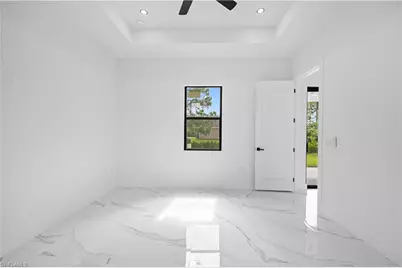 719 Fullerton Ave S, Lehigh Acres, FL 33974 - Photo 15