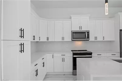 719 Fullerton Ave S, Lehigh Acres, FL 33974 - Photo 7