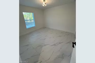 660 Ames St E, Lehigh Acres, FL 33974 - Photo 17