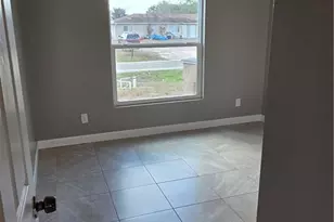 1117 Gordon Ave S, Lehigh Acres, FL 33973 - Photo 9