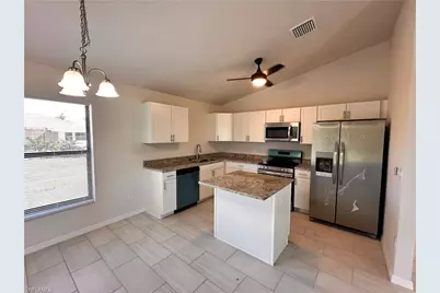 1313 NE 3rd Ter, Cape Coral, FL 33909 - Photo 3