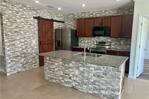 10293 Silver Pond Lane, Lehigh Acres, FL 33936 - Photo 17