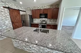 10293 Silver Pond Lane, Lehigh Acres, FL 33936 - Photo 13