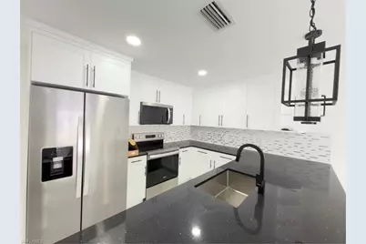 945 Homestead Rd S, Lehigh Acres, FL 33974 - Photo 11