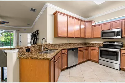 9101 Water Tupelo Rd, Fort Myers, FL 33912 - Photo 13