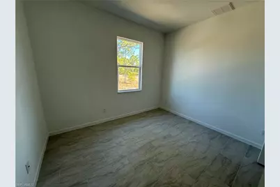 1115 Cove St E, Lehigh Acres, FL 33974 - Photo 17