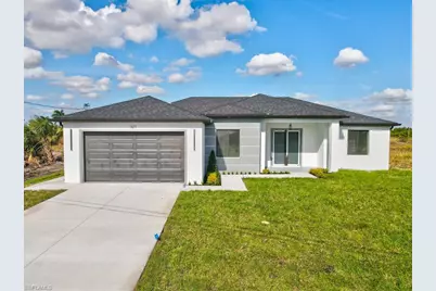 321 Peerless St, Lehigh Acres, FL 33974 - Photo 1