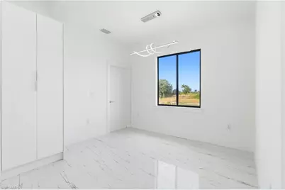 321 Peerless St, Lehigh Acres, FL 33974 - Photo 29