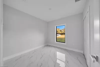 644 Woodcrest Dr, Lehigh Acres, FL 33972 - Photo 13