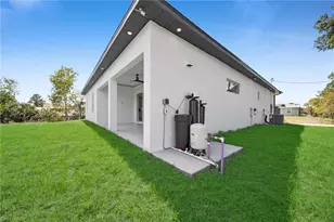 100 Denis Ave N, Lehigh Acres, FL 33971 - Photo 23