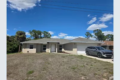 355 Paddock St, Lehigh Acres, FL 33974 - Photo 1
