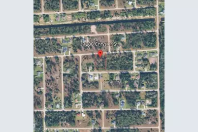 1230 Chrysler St, Lehigh Acres, FL 33974 - Photo 1