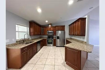 397 Pennfield Ave, Lehigh Acres, FL 33974 - Photo 3