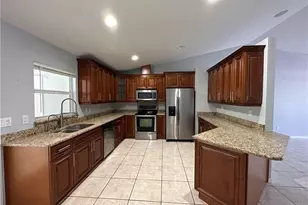 397 Pennfield Ave, Lehigh Acres, FL 33974 - Photo 3